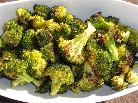 Prepare a baking sheet by lining it with parchment paper and place it onto the lower rack in the oven as the oven preheats. Roasted Broccoli - Danielle Lackey