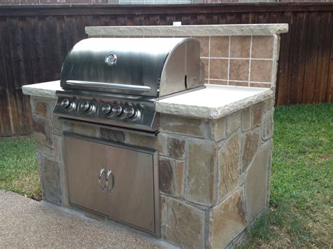 Our New Bbq Grill Island With Stone Surround With Inspiration From Pinterest The Tile