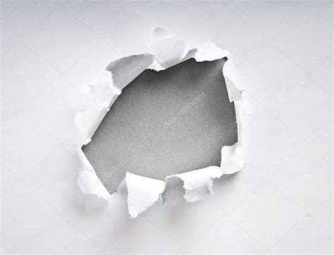 Hole In The Paper With Torn Sides — Stock Photo © Elnur 5187060