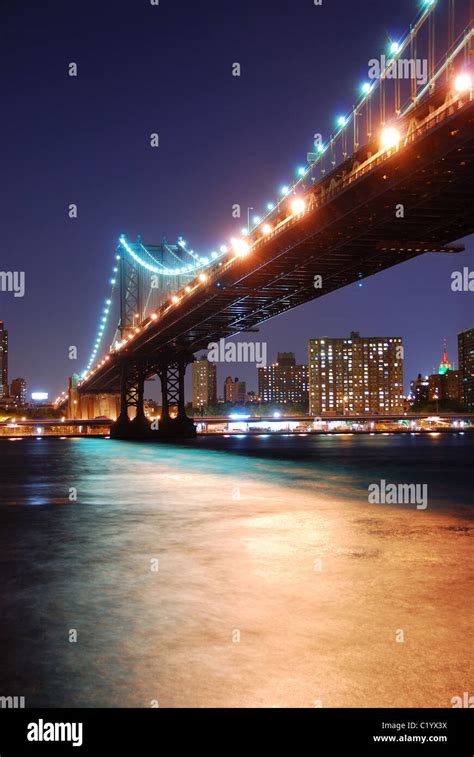 New York City Manhattan Bridge Over Hudson River With Skyline After