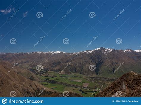 Snow Capped Mountain Peaks Seen From The Roy S Peak In New Zealand