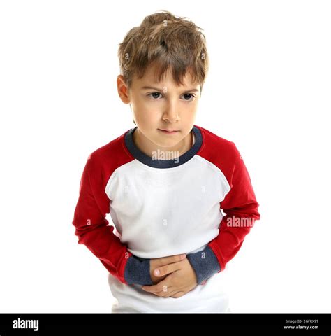 Little Boy Suffering From Stomach Ache Isolated On White Stock Photo