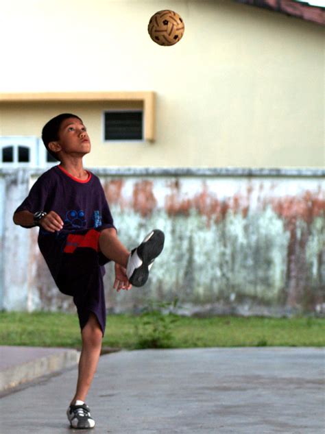 Started as more of a game to demonstrate skills and agility by keeping up various objects such as shuttlecocks or other balls. File:Sepak takraw.jpg - Wikimedia Commons