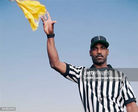 Referee Penalty Flag Photos And Premium High Res Pictures Getty Images