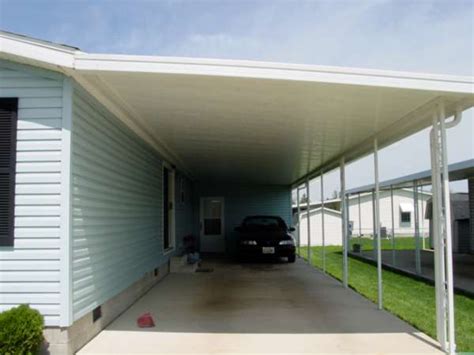 The replacement roof was installed at a steeper angle by lowering everything 3″ and solving their problem with better run off. Dacraft - Dayton Ohio - Mobile Home Products - Car Ports