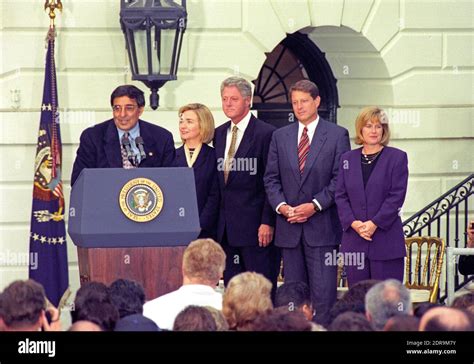 White House Chief Of Staff Leon Panetta Welcomes The Clintons And The