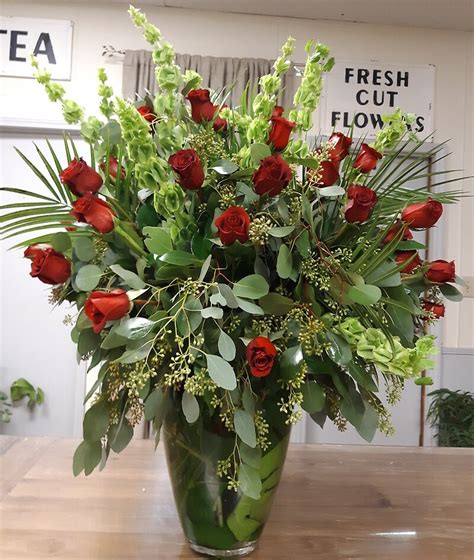 Four Dozen Red Roses Arranged By A Florist In Florence Sc Consider