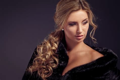 premium photo fashion seductive blond hair lady in an elegant fur coat and black underwear