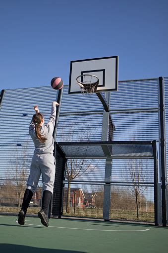 Outdoor Urban Basketball Training Session For Individual Female Teenage