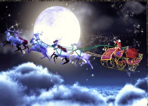 Download Santa Claus Ing To Town Riding His Reindeer Sleigh Flying In
