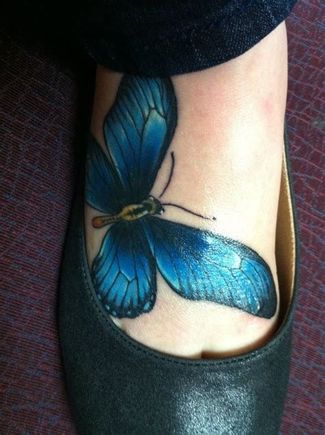 Another symmetrical leg tattoo is moth with personalized text on it. Blue Butterfly Tattoo on Foot - Design of TattoosDesign of ...