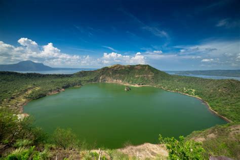 Taal volcano is located 60 km south of manila, the capital of the philippines. Best Lake Taal Stock Photos, Pictures & Royalty-Free ...