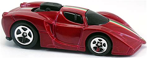 Unpainted, w/chrome engine, ferrari emblem on front & sides, chrome interior, black malaysia base, w/pr5's. Enzo Ferrari ('Tooned) - 69mm - 2004 | Hot Wheels Newsletter