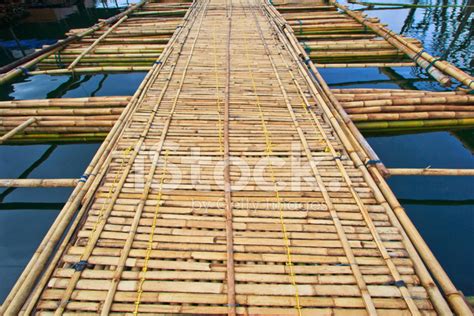 Bamboo Bridge Across The River Stock Photo Royalty Free Freeimages