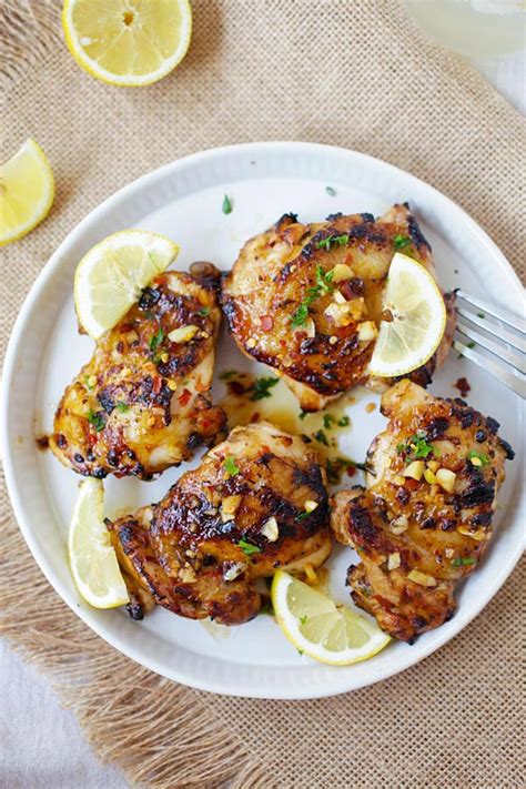 Cooking a chicken in a slow cooker makes it very succulent and packed full of flavour. Lemon Garlic Chicken | Easy Delicious Recipes