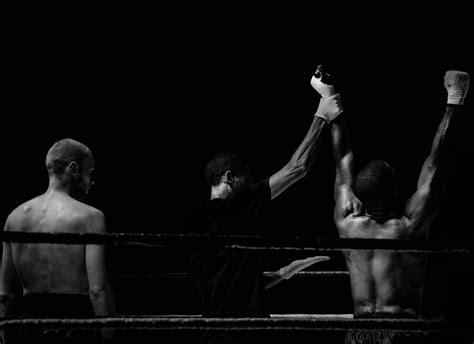 A report in the bjog: Grayscale Photography of Man Holding Boxer's Hand Inside ...
