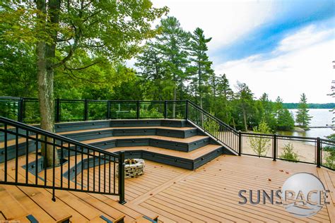 Customize with standard or wide aluminum pickets, glass panels, decorative spacers. Sunspace Sunrooms | Aluminum Railing with Glass