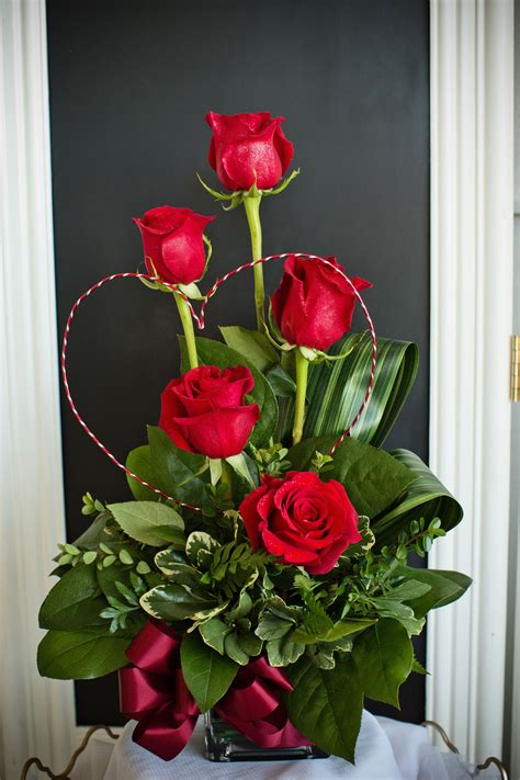a stunning and unique valentine s day arrangement created with red rose… rose flower