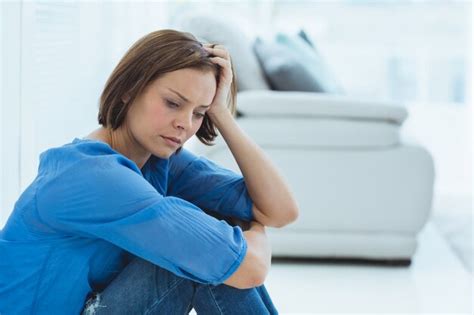 Premium Photo Depressed Woman Sitting At Home