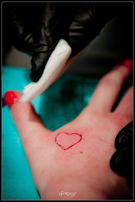 In reality, however, our bodies are also the products of culture. Heart scarification by Azl | Scarification, Tattoos, Body mods