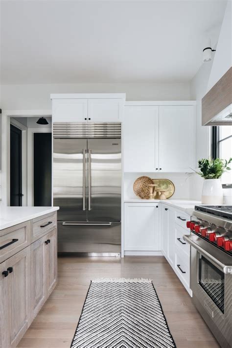 I will be changing this wall with the eat sign very soon! White kitchen with White Oak Island White kitchen cabinet ...