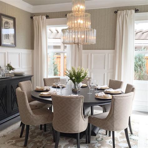 Despite their strength and durability. Elegant Dining Room with Round Table and 8 upholstered ...