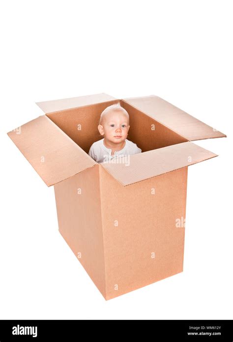 Baby Boy In A Box Isolated Against A White Background Stock Photo Alamy