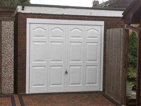 Garage door windows are available in styles that compliment your home's exterior and also add visual interest. Personnel door, window and garage door, Wirral - Pennine ...