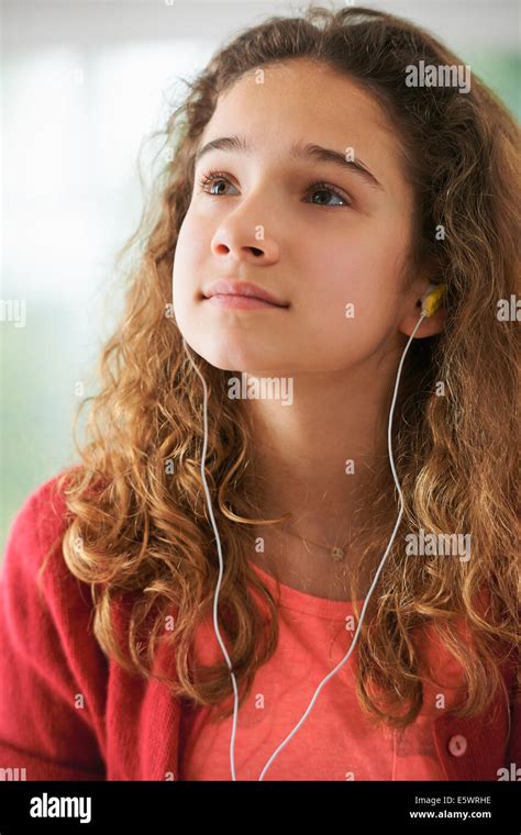 Portrait Of Young Girl Wearing Headphones Stock Photo Alamy