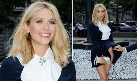 Elizabeth Olsen Flashes Her Pants As She Falls Victim To A Gust Of Wind