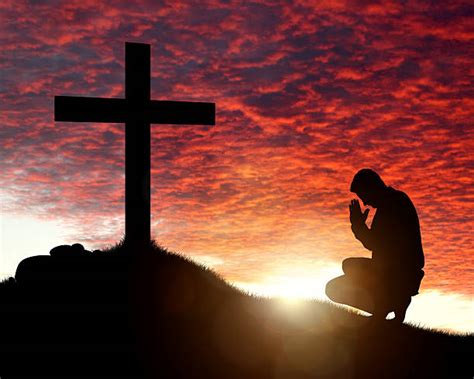 Kneeling Cross Stock Photos Pictures And Royalty Free Images Istock