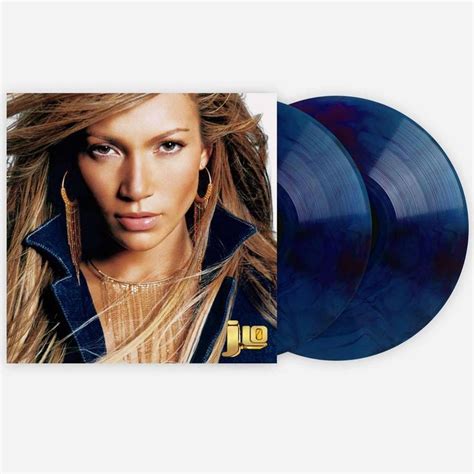 An Image Of A Woman With Long Hair And Blue Vinyl Records In Front Of Her