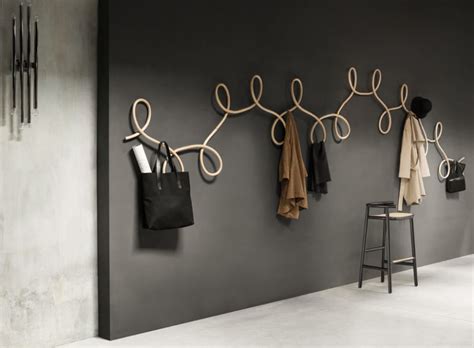 Unique spiral coat rack / coat hanger made in rare steam bending technique will make a true wow affect at your entryway each coat rack comes with mounting screws, drywall anchors and install instructions. Sculptural Coat Rack Inspired By Waltz Dancing - DigsDigs