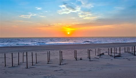 Calm Tides Outer Banks Sunrise Photograph By Dan Carmichael