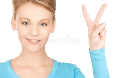 Young Woman Showing Victory Or Peace Sign Stock Photo Image Of Hand