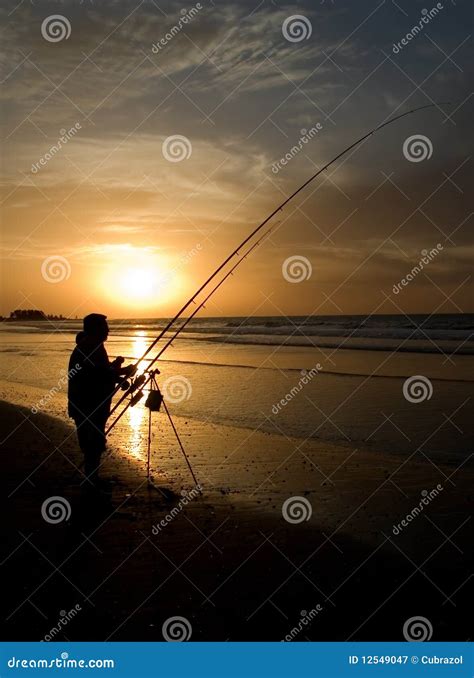 Fisherman At Sunset Stock Image Image Of Angler Shore 12549047