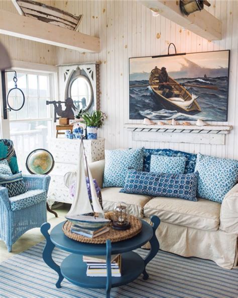 A Living Room Filled With Furniture And A Sailboat Painting On The Wall