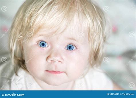A Little Cute Baby With Blue Eyes Stock Image Image Of Care