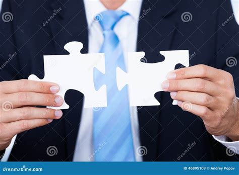 Businessman Holding Jigsaw Puzzle Stock Image Image Of Piece Human