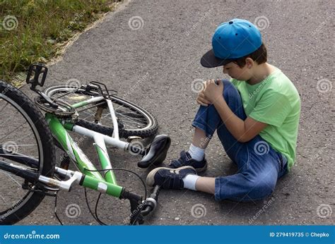 Child Fell Off Bicycle Boy Keeps Self For Bruised Knee Stock Image