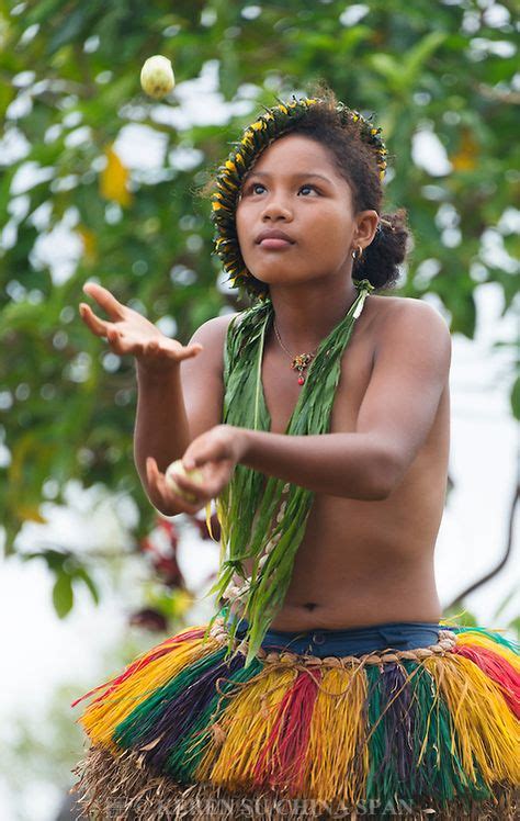 Yapese Girl In Traditional Clothing Juggling Fruit At Yap Day Festival