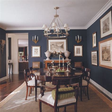 The plain walls painted in opulent blue color reflect radiant and powerful energy. I've really been into dark walls lately. | Dining room ...