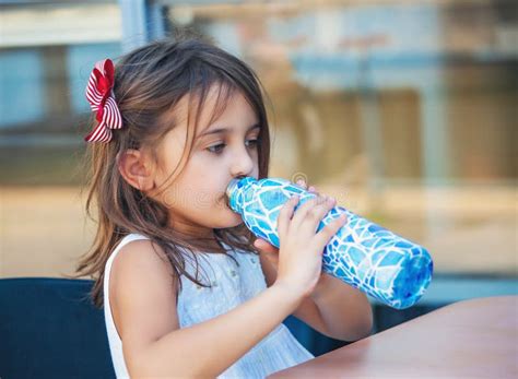 Children Drinking Water In A Drinking Fountain Stock Photo Image Of