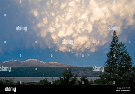 Striking Display At Sunset As Mammatus Cloud Is Under Lit By The Low
