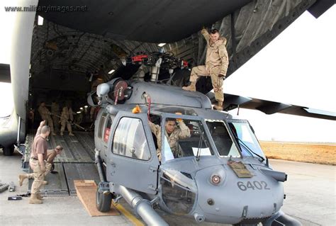 Loading A Uh 60l Blackhawk Helicopter Into A C 17 A Military Photos