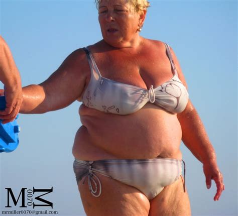 BBW GRANNY AND MILF BEACH VOYEUR HUGE BELLY MUST SEE 14 Pics