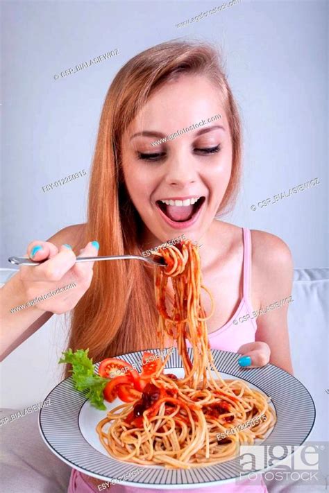 Girl Eating Spaghetti Stock Photo Picture And Low Budget Royalty Free Image Pic Esy