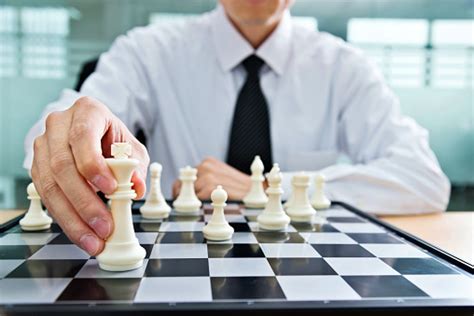 Businessman Moving The Chess King Stock Photo Download Image Now Istock