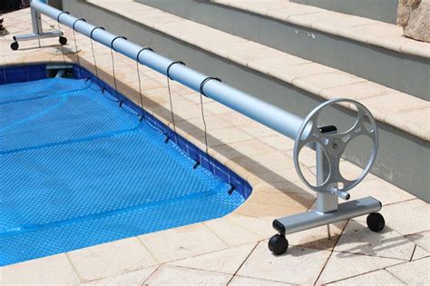 Elegance Reels A Pool Cover With Roller Make Pool Owning Easy