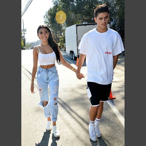 madison beer holds hands with a mystery man at just jareds party los angeles ca madisonbeer